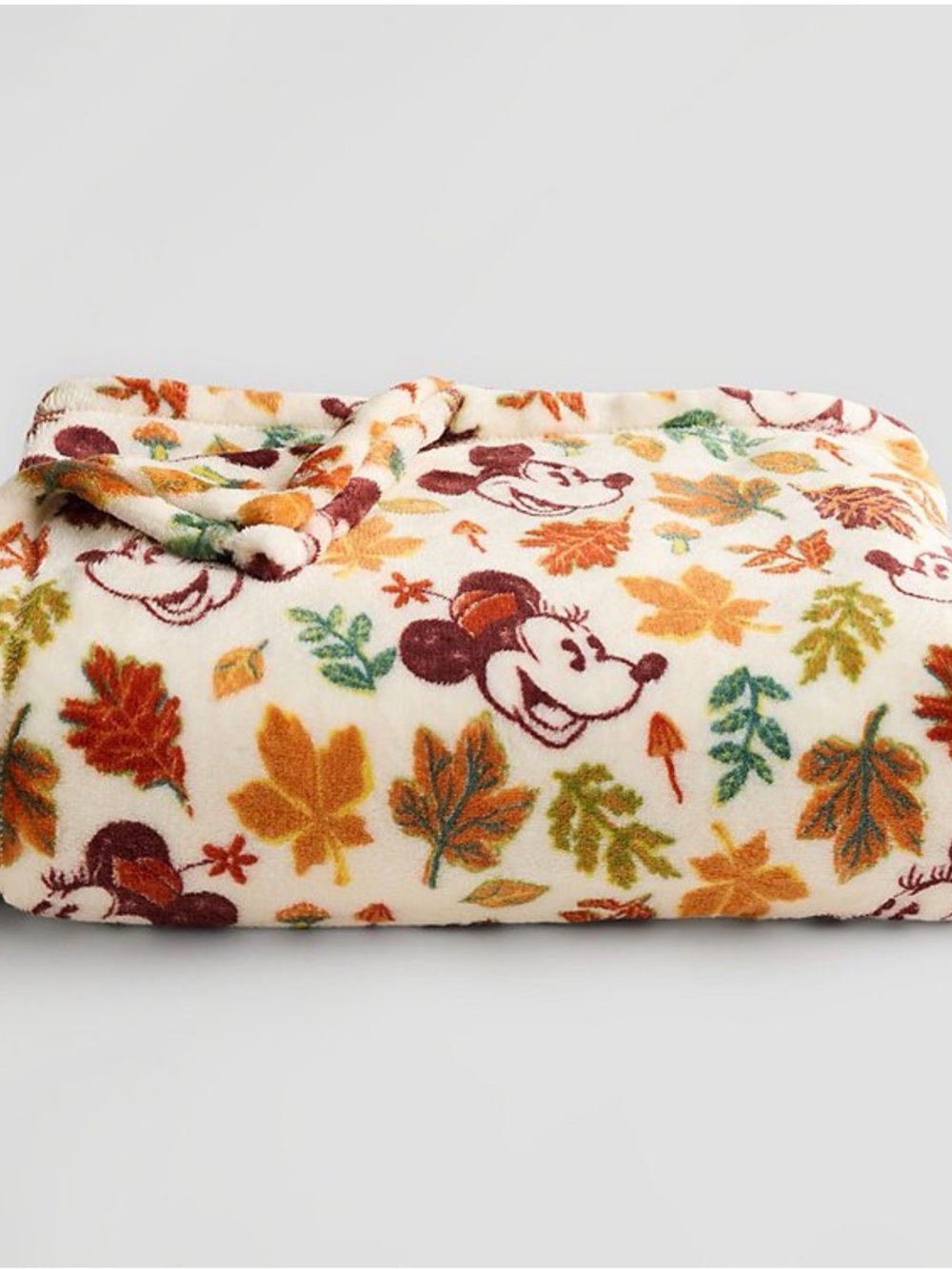 The Big One Cream Plush Throw Blanket with Autumn Leaf and Character Print